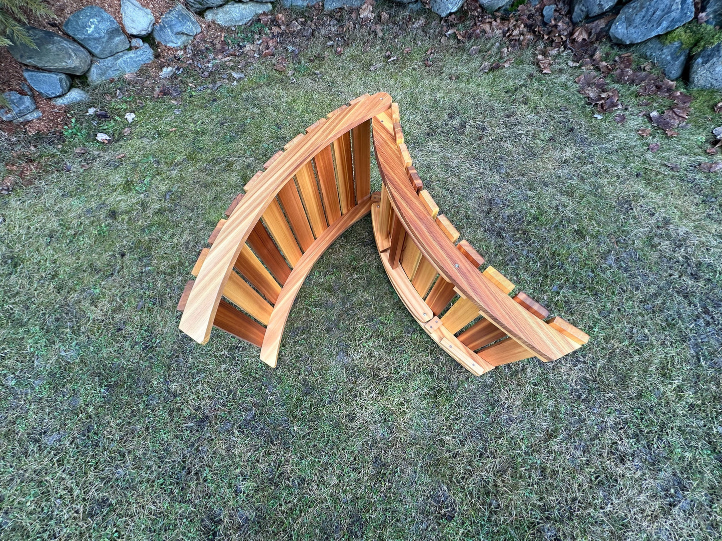 Cedar lounger folded in half for more compact storage