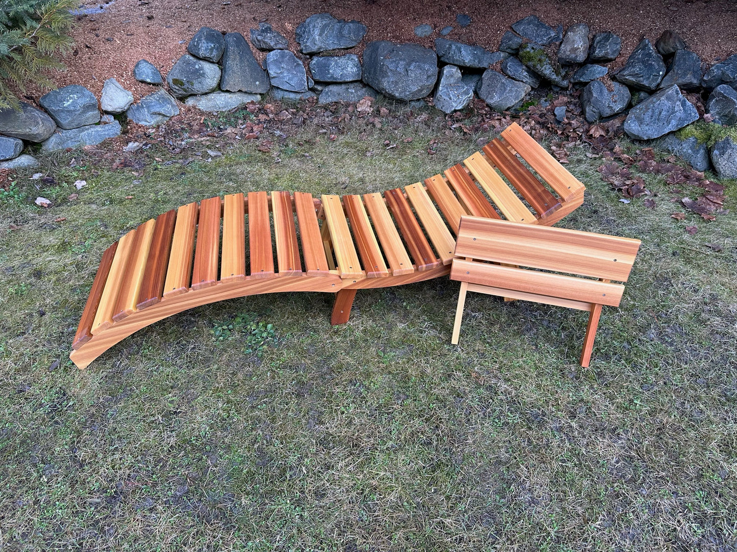 Cedar folding lounger with removable two-slat headrest shown separately