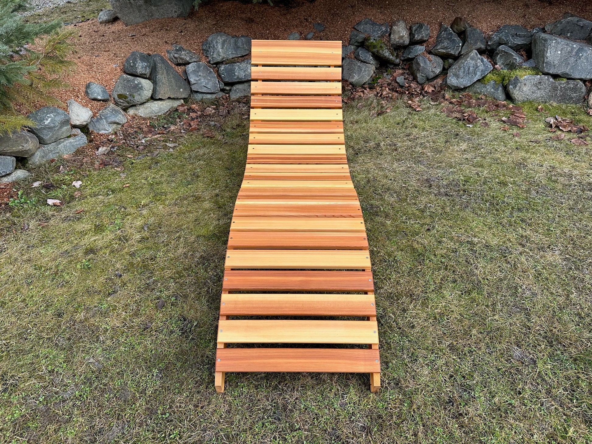 View along the slatted seating surface of a Western Red Cedar lounger