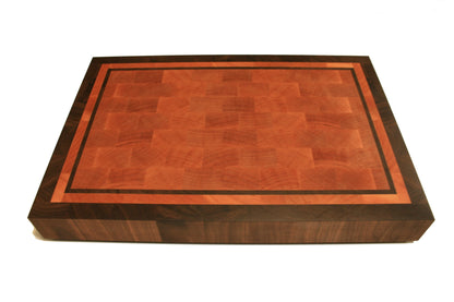 Front view of a bordered Eastern Maple and Black Walnut end-grain cutting board
