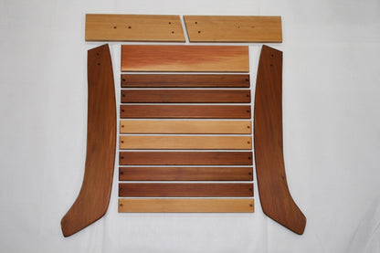 Unassembled cedar Adirondack footrest parts laid out for assembly