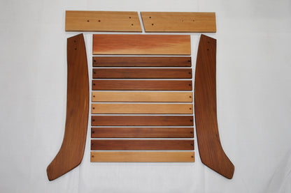 Footrest kit components arranged before assembly, showing the separate cedar parts included in the package