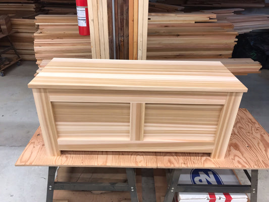 Front view of a Western Red Cedar blanket chest showing the paneled construction and cedar grain